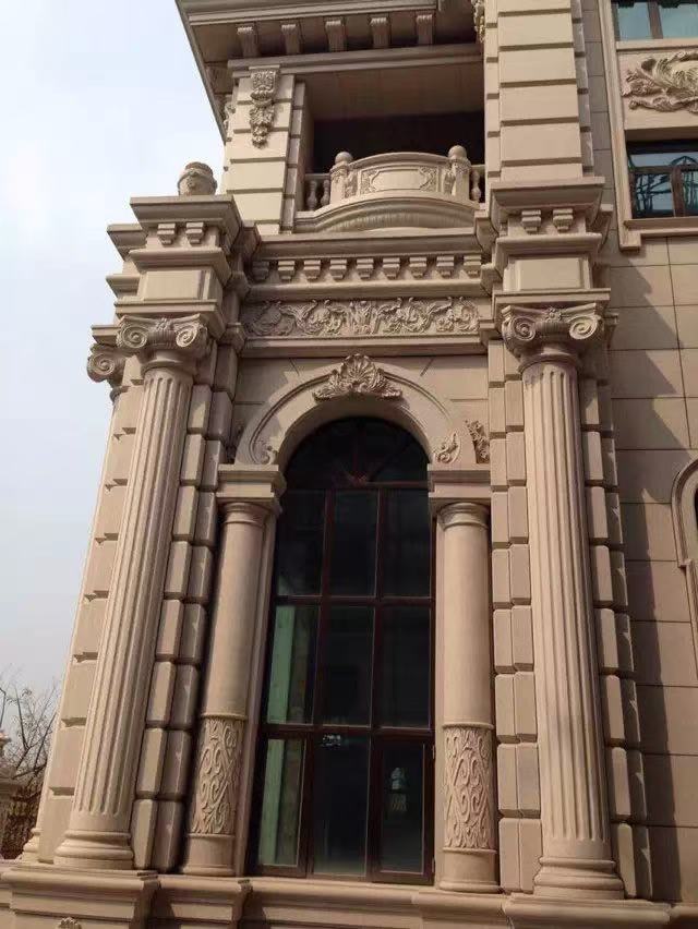Ornate custom GFRC columns, capitals, surrounds, and façade details