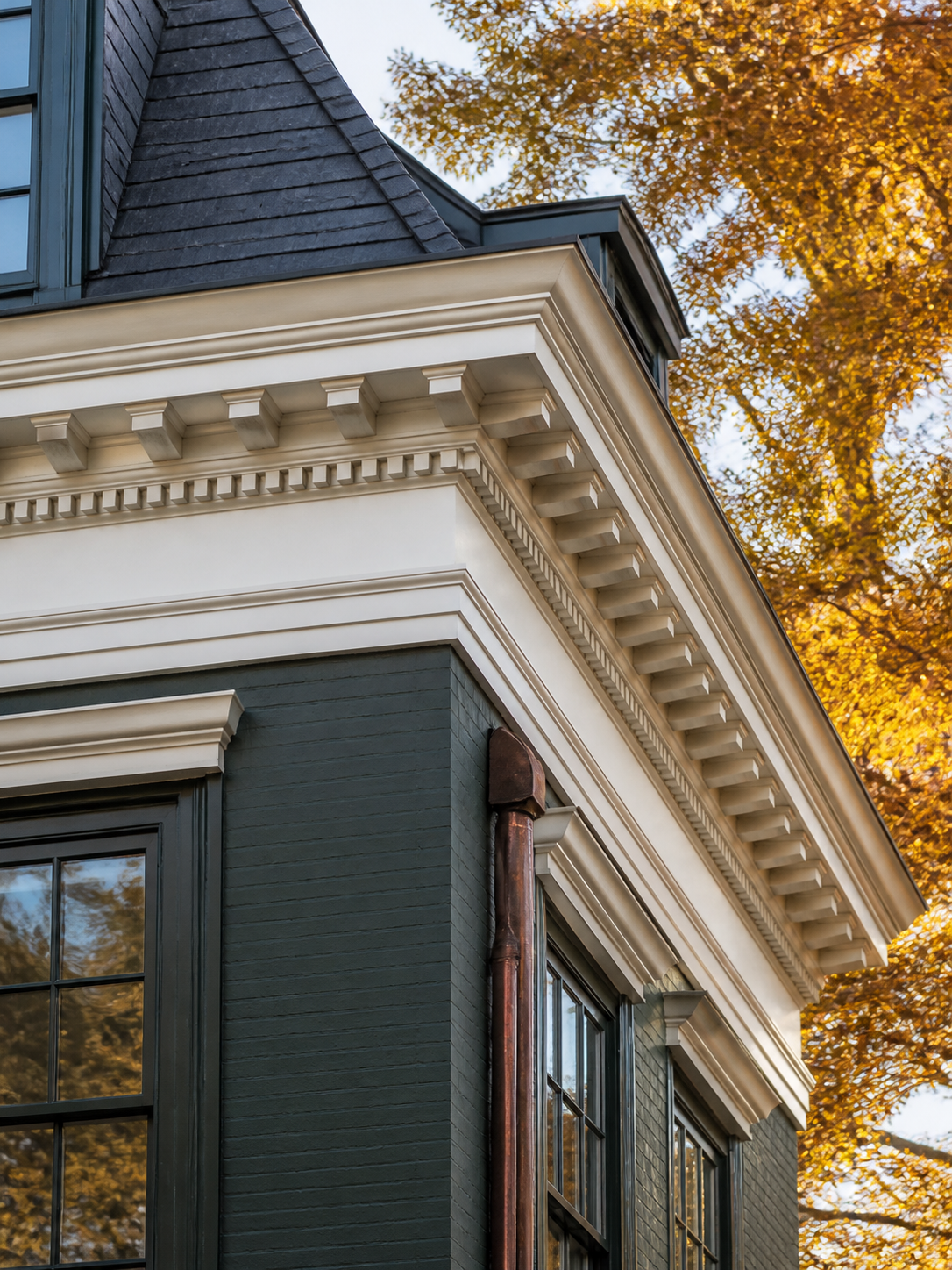 Close-up of a projecting EPS roof cornice with layered fascia details